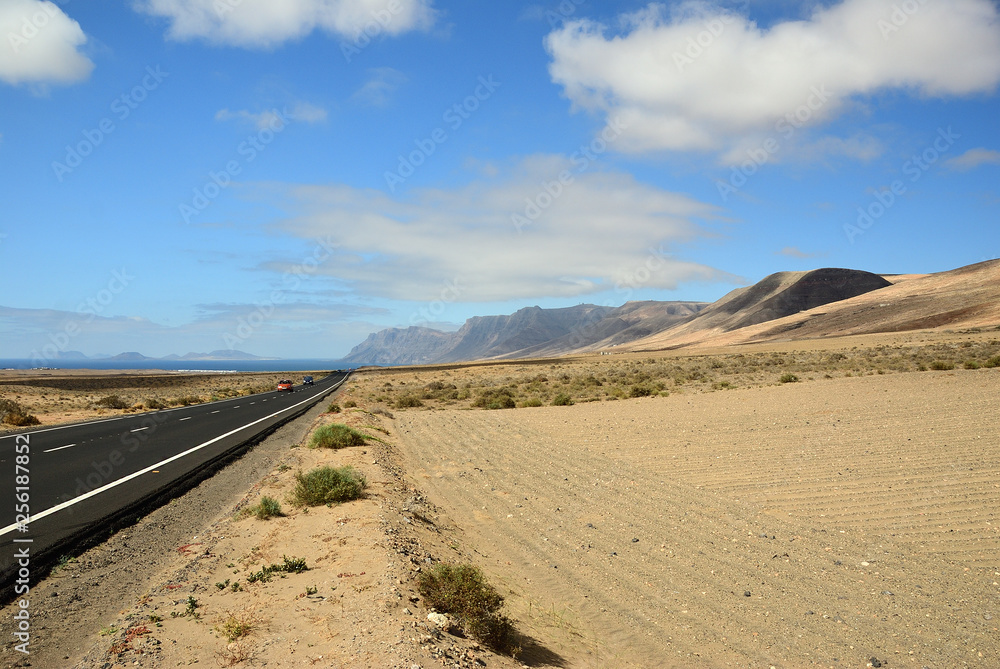 Tar road to ocean. Lanzarote. Canary islands. Spain