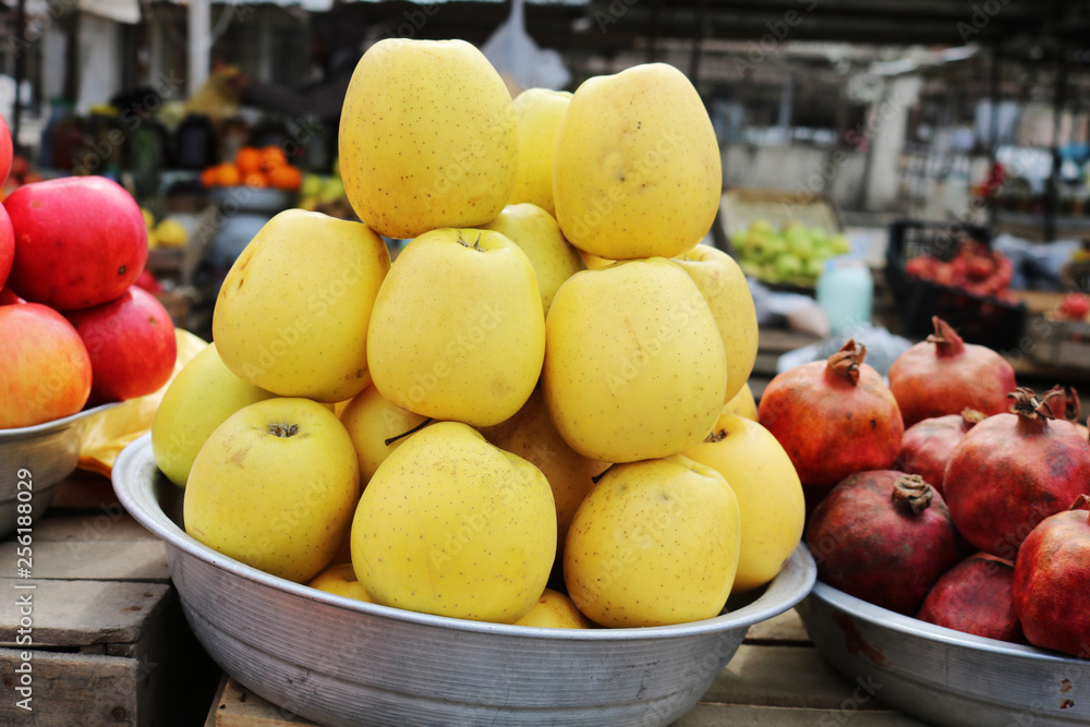 Yellow apples at the fair or at the bazaar Yellow apples at the fair or at the bazaar