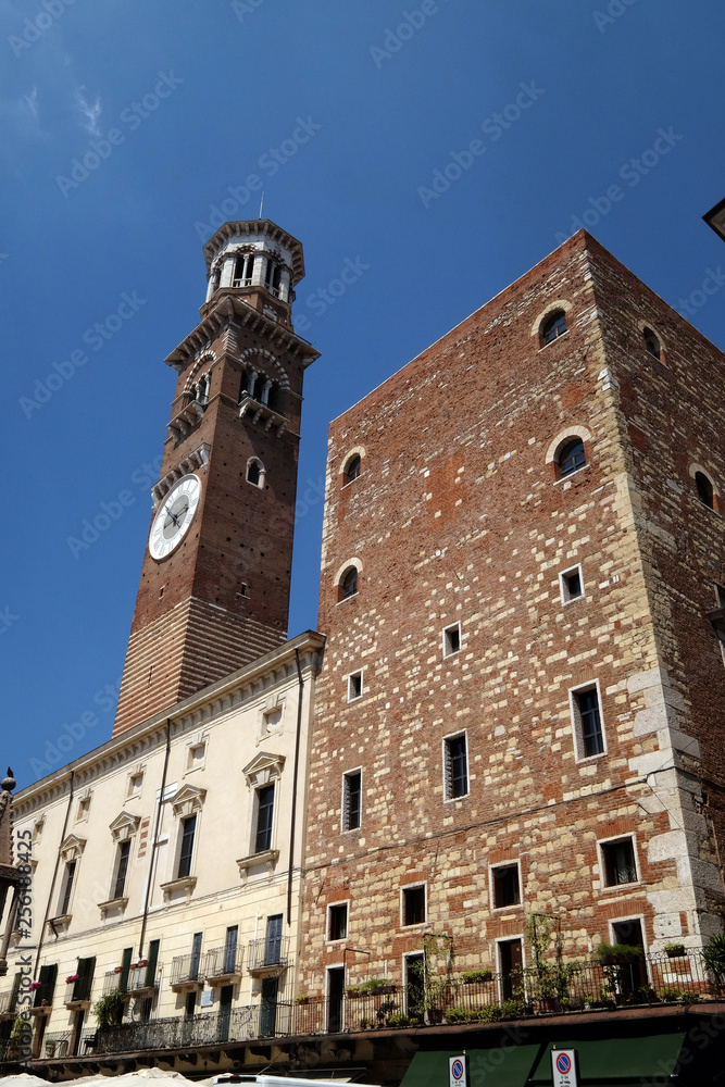 Torre dei Lamberti - medieval tower of the Lamberti XI century - 84 m. Piazza delle Erbe, UNESCO world heritage site  in Verona, Italy
