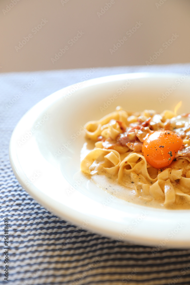 Homemade pasta with white sauce , spaghetti carbonara , italian food Homemade pasta with white sauce , spaghetti carbonara , italian food