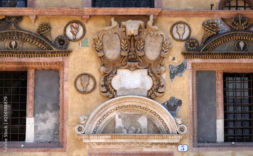 Bass relief on the wall of Palazzo Ragione in Piazza dei Signori in Verona, Italy