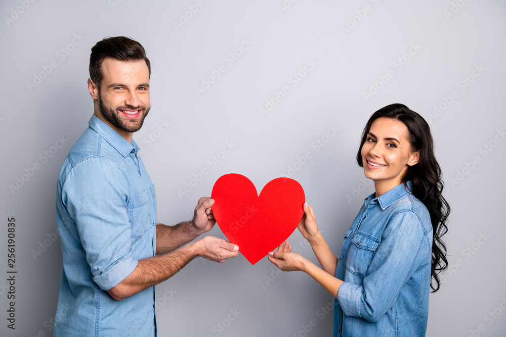 14-february Portrait of beautiful charming affectionate students showing regard respect trust support holding heart-shaped gifts presents isolated wearing blue jeans shirts on silver background 14-february Portrait of beautiful charming affectionate students showing regard respect trust support holding heart-shaped gifts presents isolated wearing blue jeans shirts on silver background