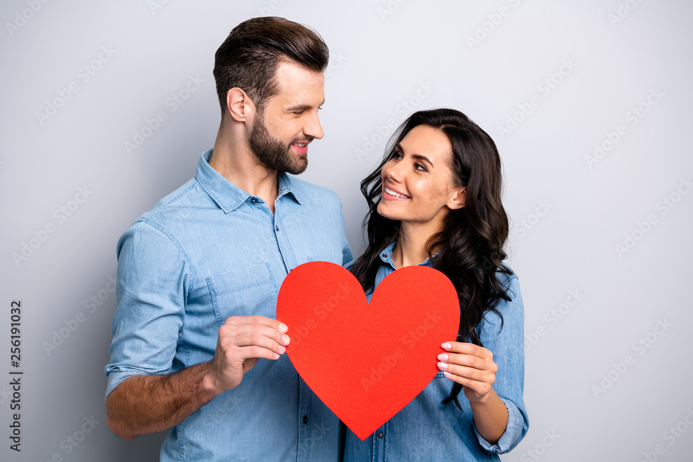 Portrait of nice beloved candid joyful married students isolated looking dreamy trusting respecting enjoying 14-february dressed in denim blue clothes on silver background Portrait of nice beloved candid joyful married students isolated looking dreamy trusting respecting enjoying 14-february dressed in denim blue clothes on silver background