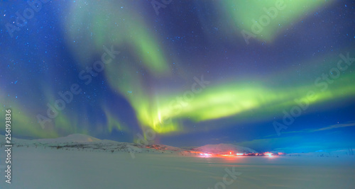 Fototapeta Naklejka Na Ścianę i Meble -  Northern lights in the sky over Tromso, Norway 