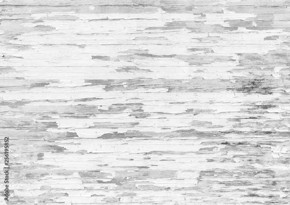 High resolution full frame background of a weathered and faded wooden wall or wood panelling in black and white, paint mostly peeled off. High resolution full frame background of a weathered and faded wooden wall or wood panelling in black and white, paint mostly peeled off.