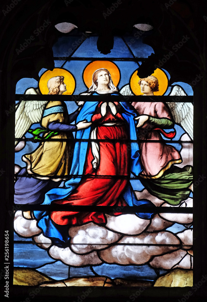 Assumption of the Virgin Mary, stained glass window in Saint Severin church in Paris, France 