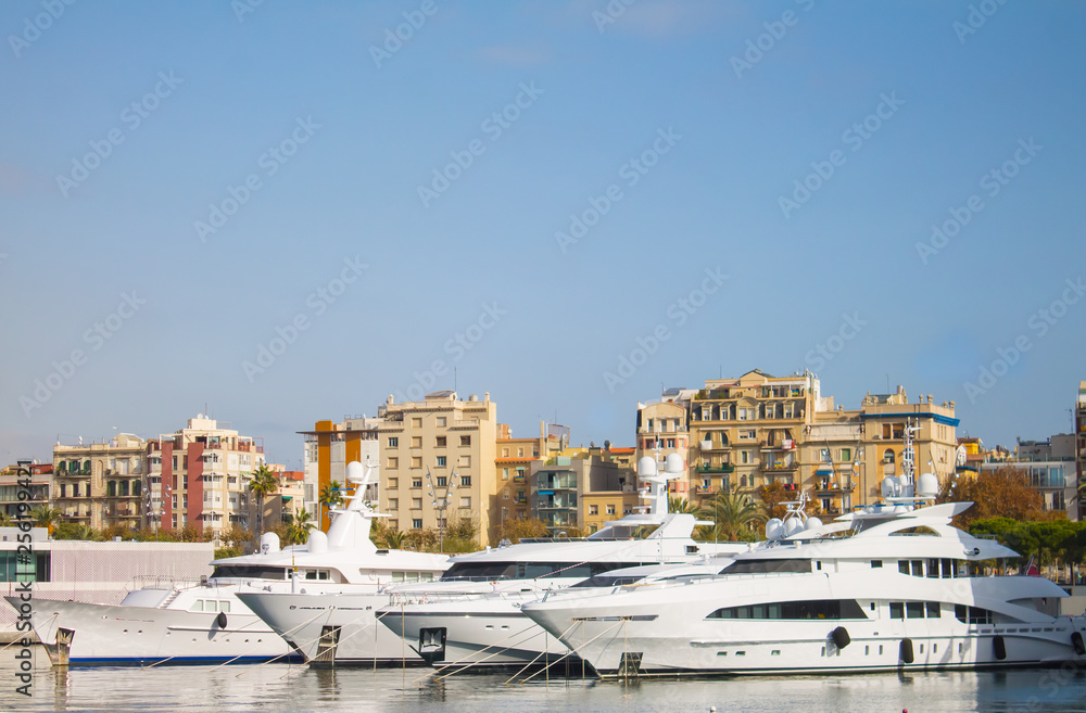 Fototapeta premium Luxury Yachts at the sea harbor, Barcelona, Spain