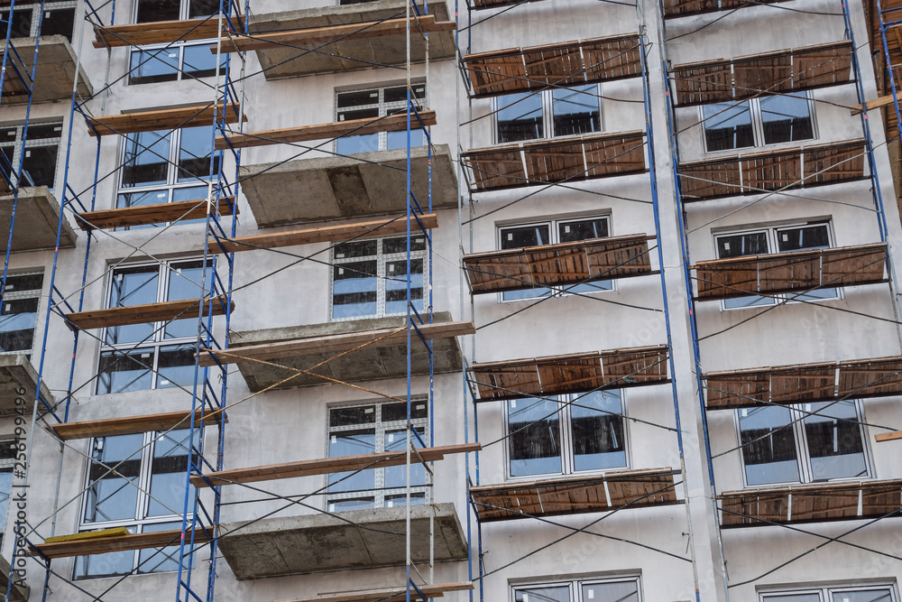 Construction of a multistorey residential building. Share constr Construction of a multistorey residential building. Share constr