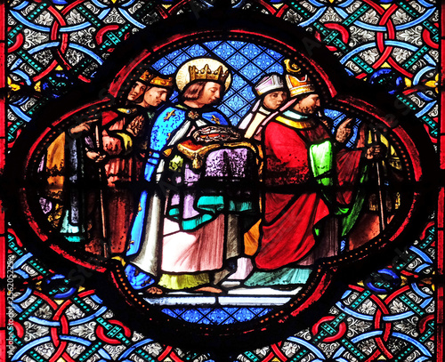 Saint Louis bringing the Crown of Thorns, stained glass window in the Basilica of Saint Clotilde in Paris, France