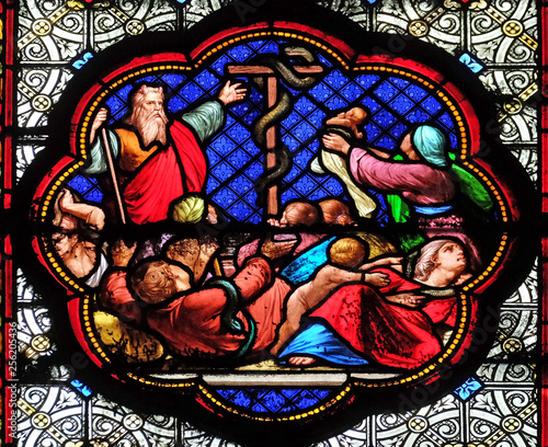 Exposition of the brass serpent in the desert  prefiguration of the Crucifixion  stained glass window in the Basilica of Saint Clotilde in Paris  France 