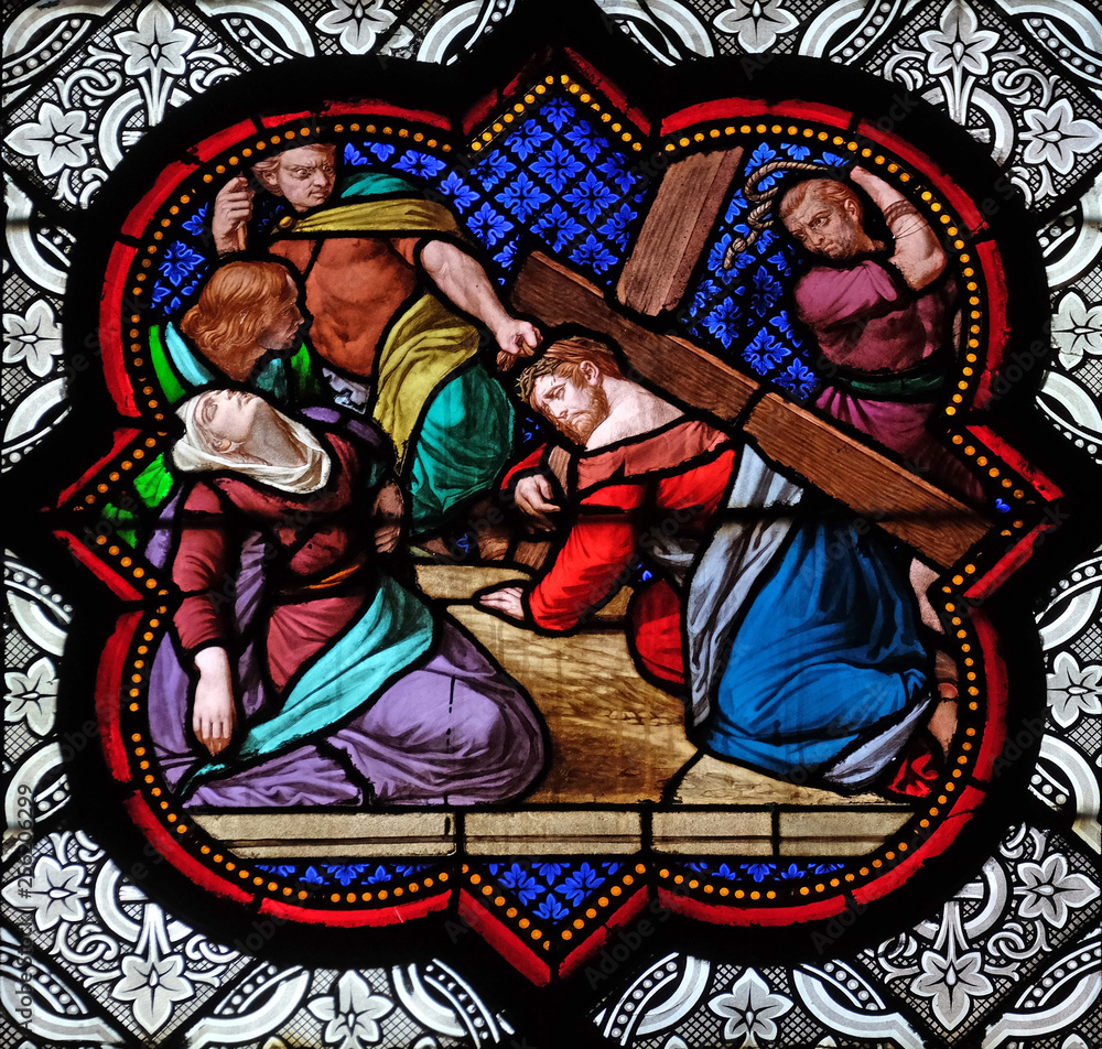 The climb to Calvary, stained glass window in the Basilica of Saint Clotilde in Paris, France 