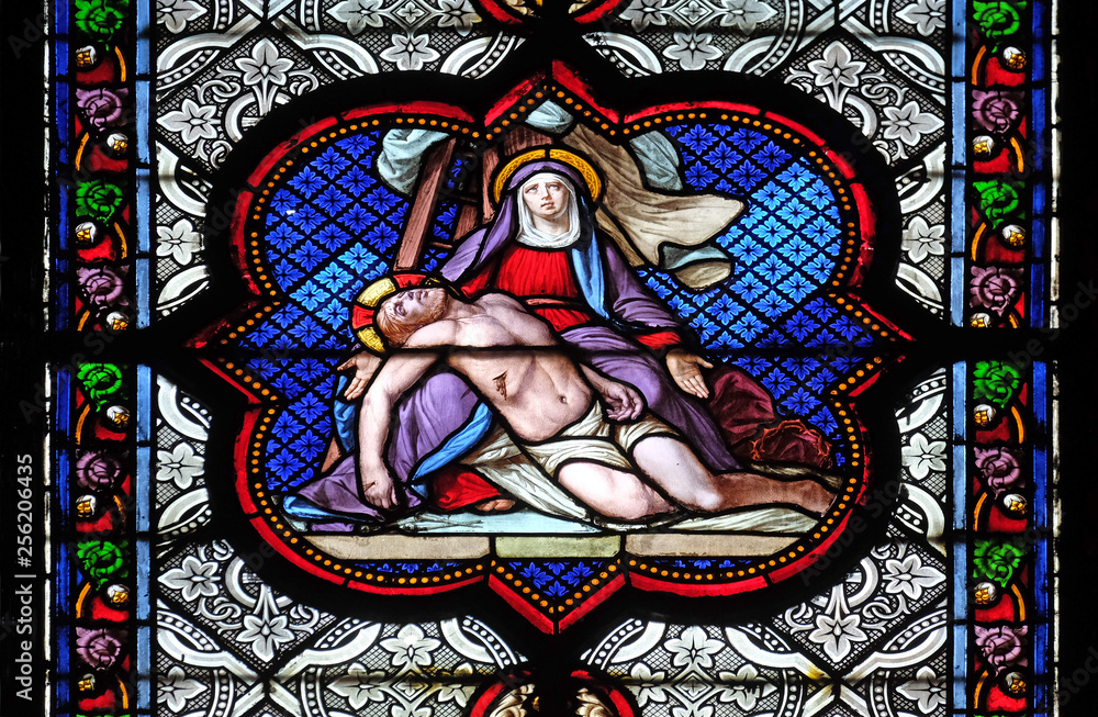 Deposition from the Cross, stained glass window in the Basilica of Saint Clotilde in Paris, France