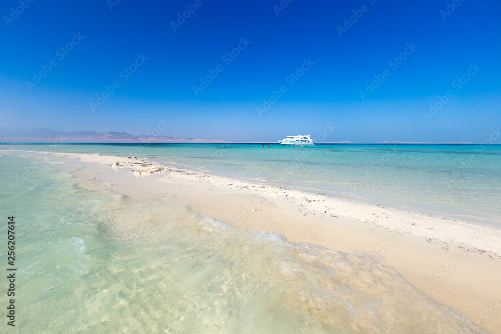 Fototapeta premium tropical Maldives island with white sandy beach and sea