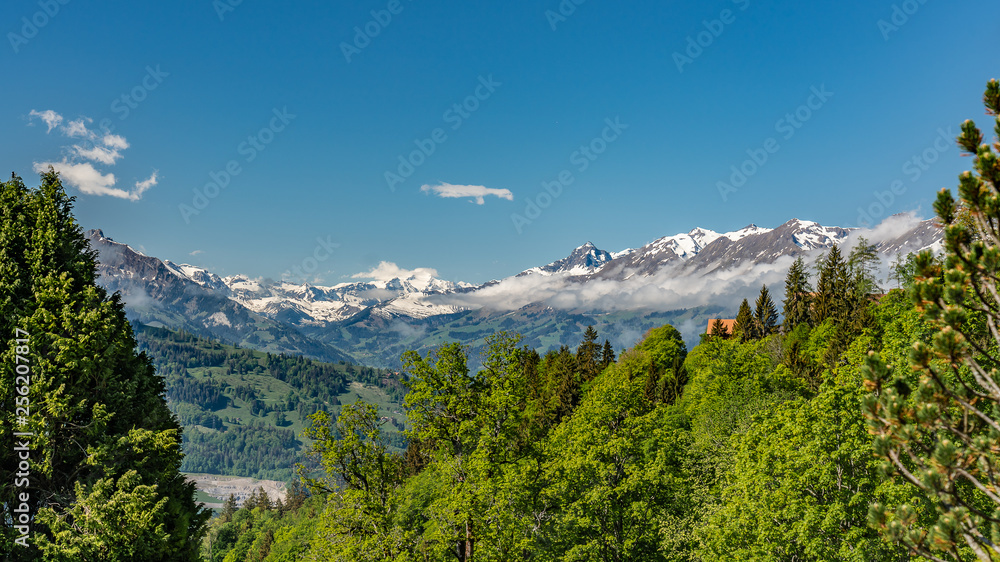 Switzerland, wonderful view on snow Alps near Beatenberg village Switzerland, wonderful view on snow Alps near Beatenberg village