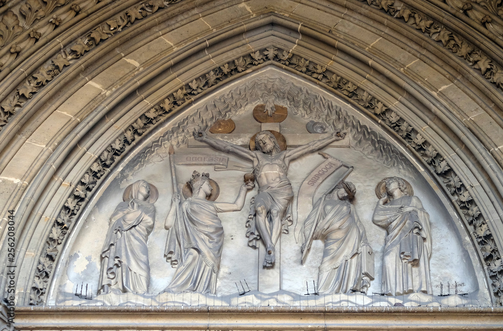 Crucifixion bass relief on the portal of the Basilica of Saint Clotilde in Paris, France