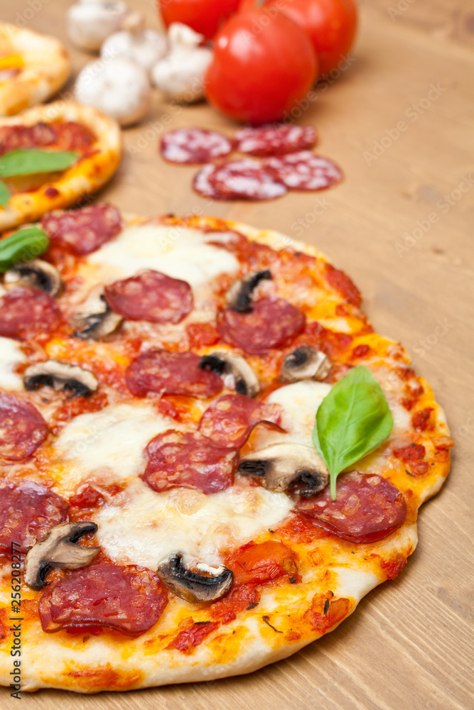 whole pepperoni and mushroom pizza with ingredients whole pepperoni and mushroom pizza with ingredients