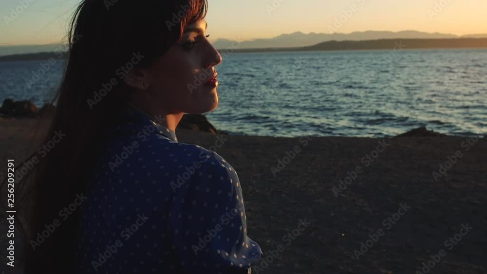 Woman Walking Slow Motion to Ocean Looking Seductive at Sunset Woman Walking Slow Motion to Ocean Looking Seductive at Sunset
