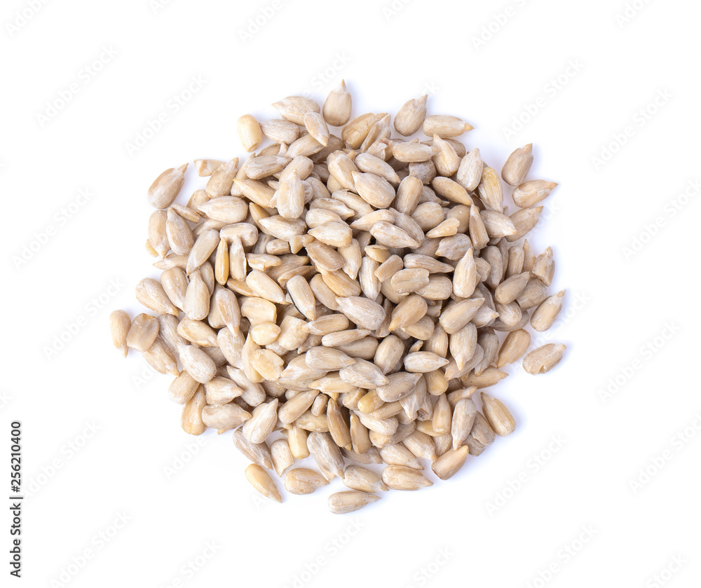 Peeled Sunflower seeds isolated on white background. Top view