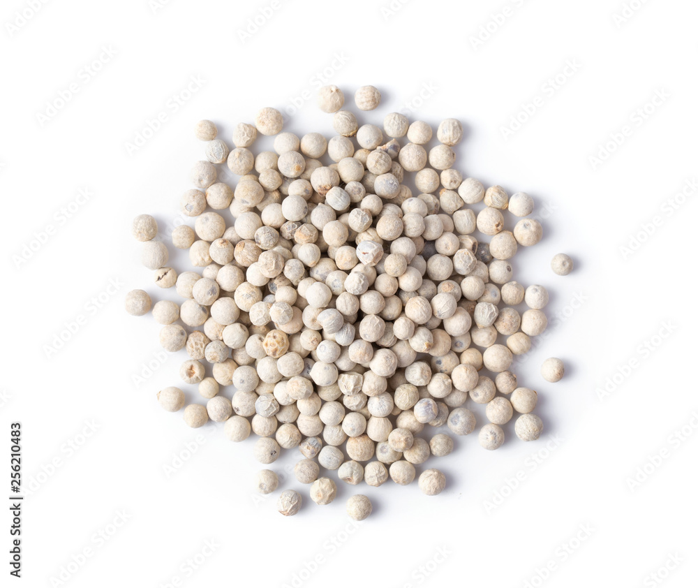 white peppers corn on the white background. top view white peppers corn on the white background. top view