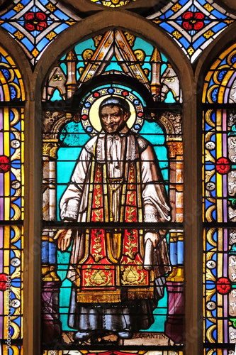 Saint Vincent de Paul  stained glass window from Saint Germain-l Auxerrois church in Paris  France 