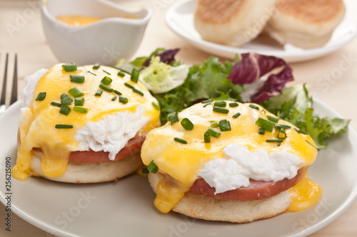 Eggs Benedict- toasted English muffins, ham, poached eggs hollandaise sauce
