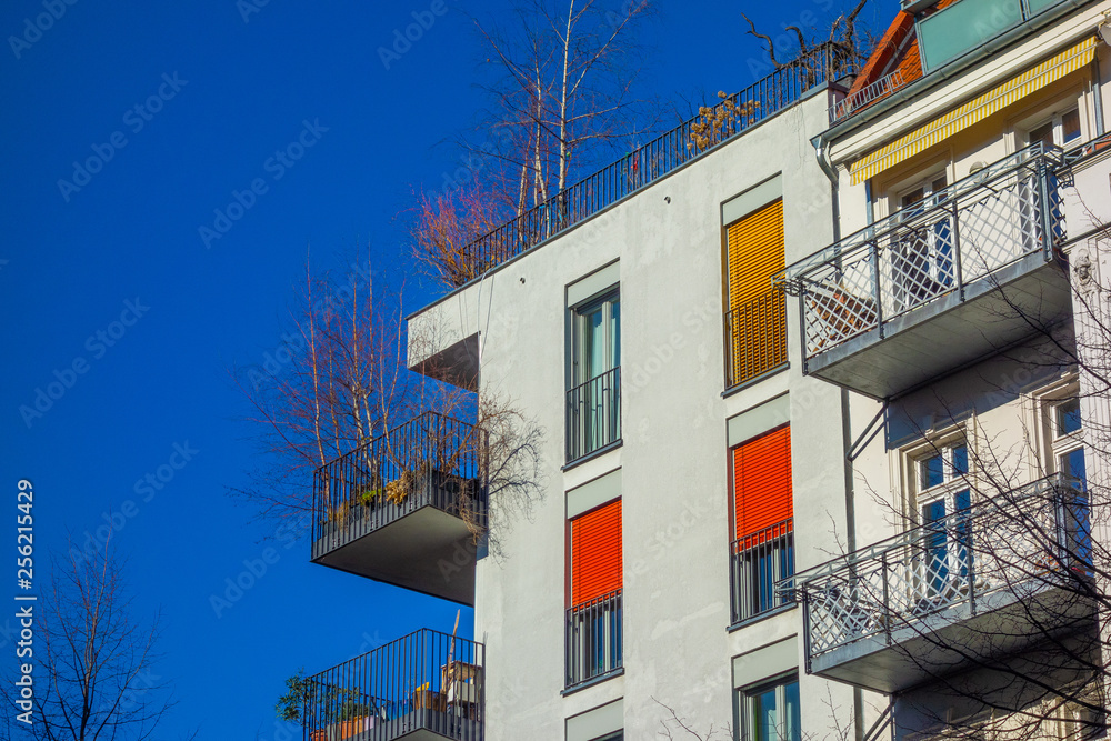 Obraz premium some colorful apartments from the exterior view with darken sky