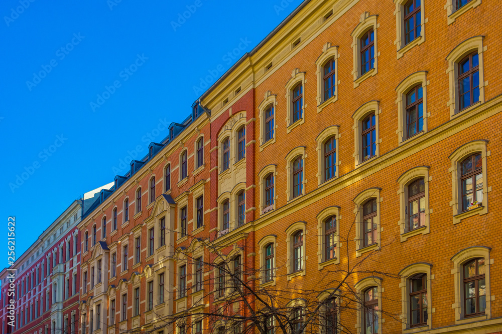 brick apartment houses at berlin in a vanishing point view