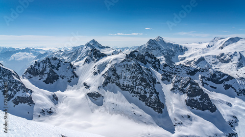 Canvas Print Switzerland, panorama view from Titlis mountain on Alps and mountains above whit