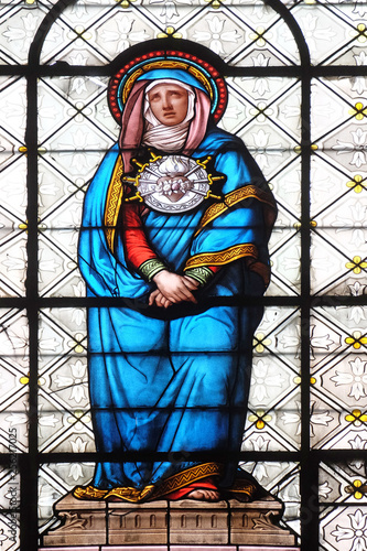 Seven Sorrows of the Virgin Mary, stained glass window in the Basilica of Notre Dame des Victoires in Paris, France photo