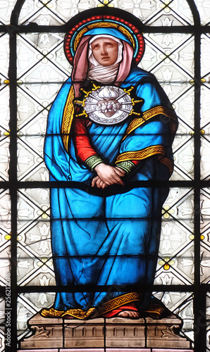 Seven Sorrows of the Virgin Mary, stained glass window in the Basilica of Notre Dame des Victoires in Paris, France photo