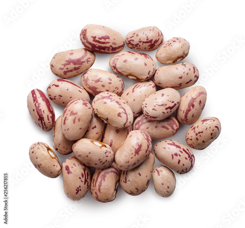 A pile of pinto beans isolated on white background.