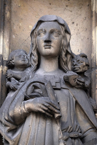 Sainte Genevieve, statue on the portal of the Saint Nicholas des Champs Church, Paris, France