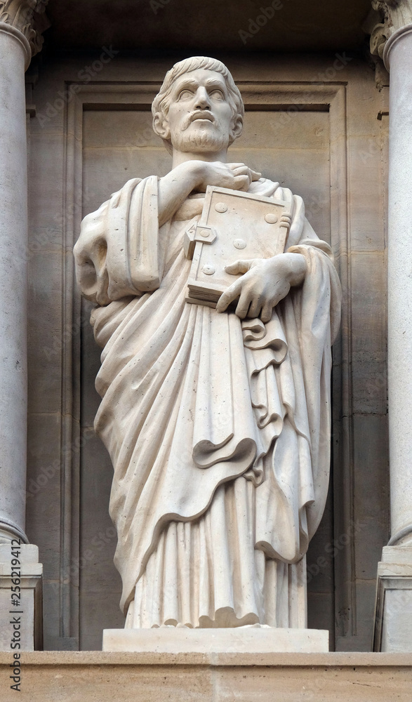 Statue of Saint Augustine on the facade of Saint Augustine church in Paris, France 