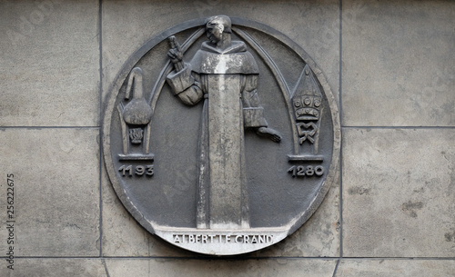 Albertus Magnus, also known as Saint Albert the Great, was a German Catholic Dominican friar and bishop. Stone relief at the building of the Faculte de Medicine Paris photo