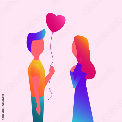 Junge schenkt Mädchen Herzluftballon