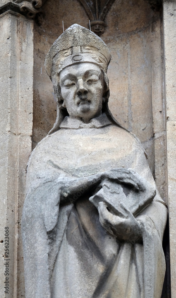 Saint Cera statue on the portal of the Saint Germain l'Auxerrois church in Paris, France