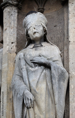Saint Marcel statue on the portal of the Saint Germain l'Auxerrois church in Paris, France 