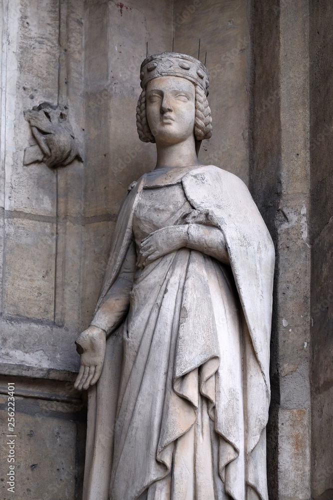 Saint Isabelle of France statue on the portal of the Saint Germain l'Auxerrois church in Paris, France