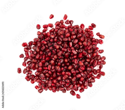 Peeled red pomegranate on white background