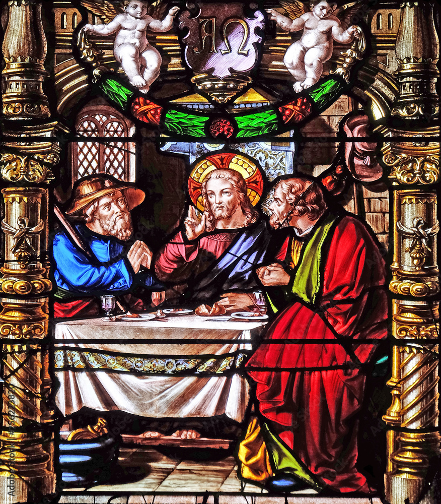 Obraz premium Supper at Emmaus, stained glass windows in the Saint Gervais and Saint Protais Church, Paris, France
