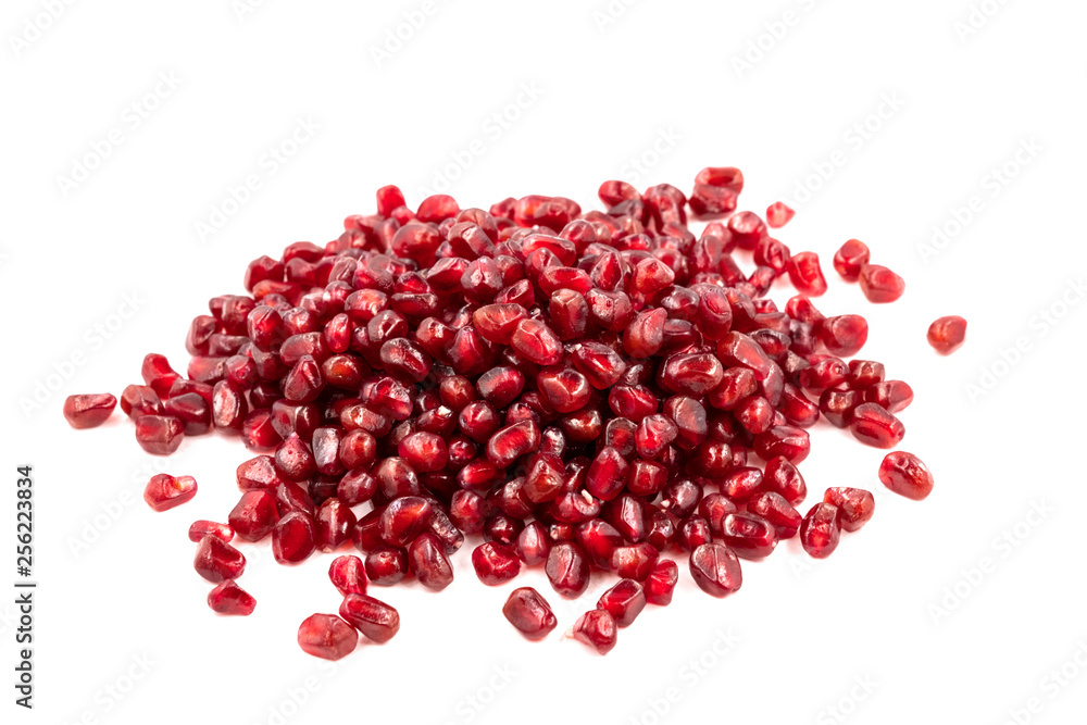 Peeled red pomegranate on white background Peeled red pomegranate on white background