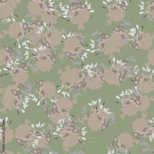 Field camouflage of various shades of green  brown and white colors