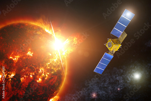 Space exploration satellite to monitor the actinicity of a Sun star. Fixed a powerful flash on the surface of the photosphere with dark spots. Elements of this image are furnished by NASA. photo