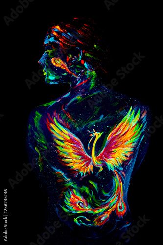 UV bodyart on fenix rising on a back