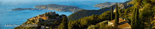 Village of Eze with Saint-Jean-Cap-Ferrat and the Mediteranean Sea in Summer. French Riviera panoramic view. Alpes-Maritime, Provence Alpes Cote d'Azur, France photo