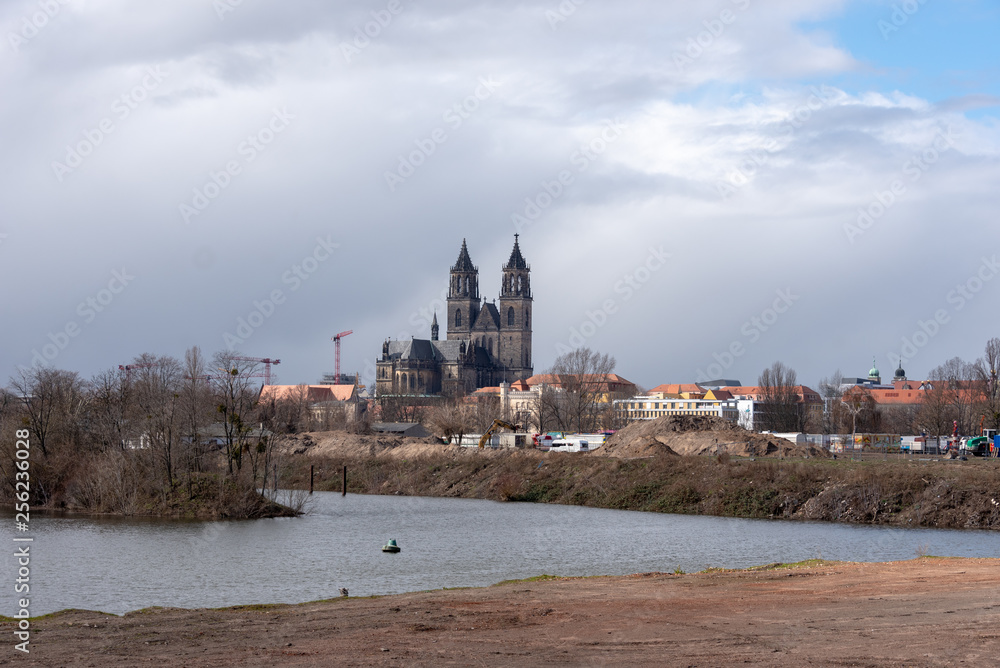 View of the river Alte Elbe and the cathedral in Magdeburg, Germany.