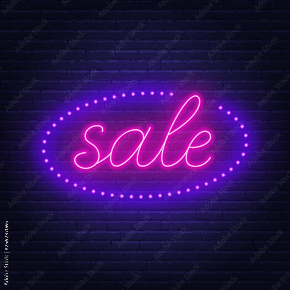 Sale neon sign.Advertising Board on brick wall background.