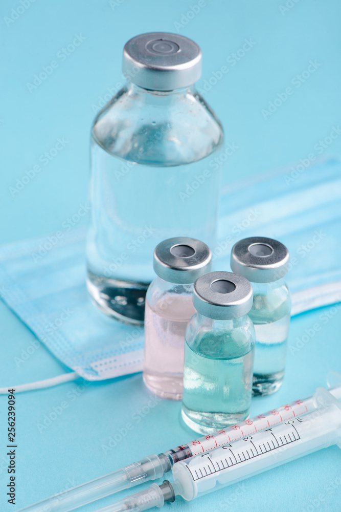 Vials, syringes and face mask