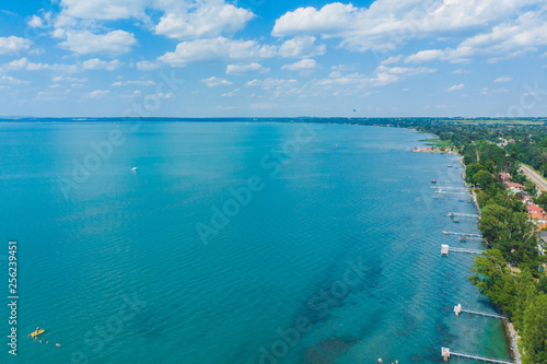 aerial view of lake with swimming people. summer time