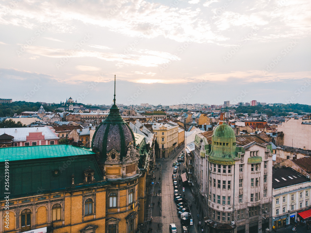 Fototapeta premium aerial view of old european city on sunset